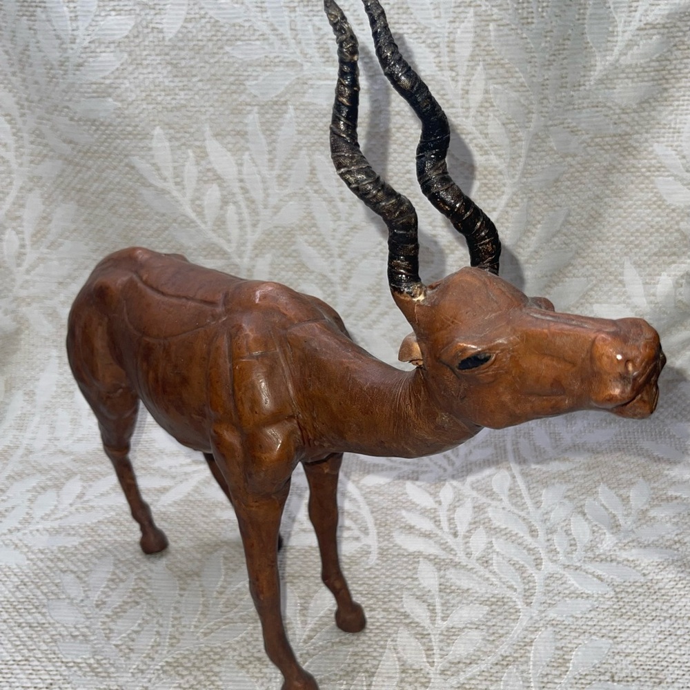 Vintage leather-wrapped Impala figurine